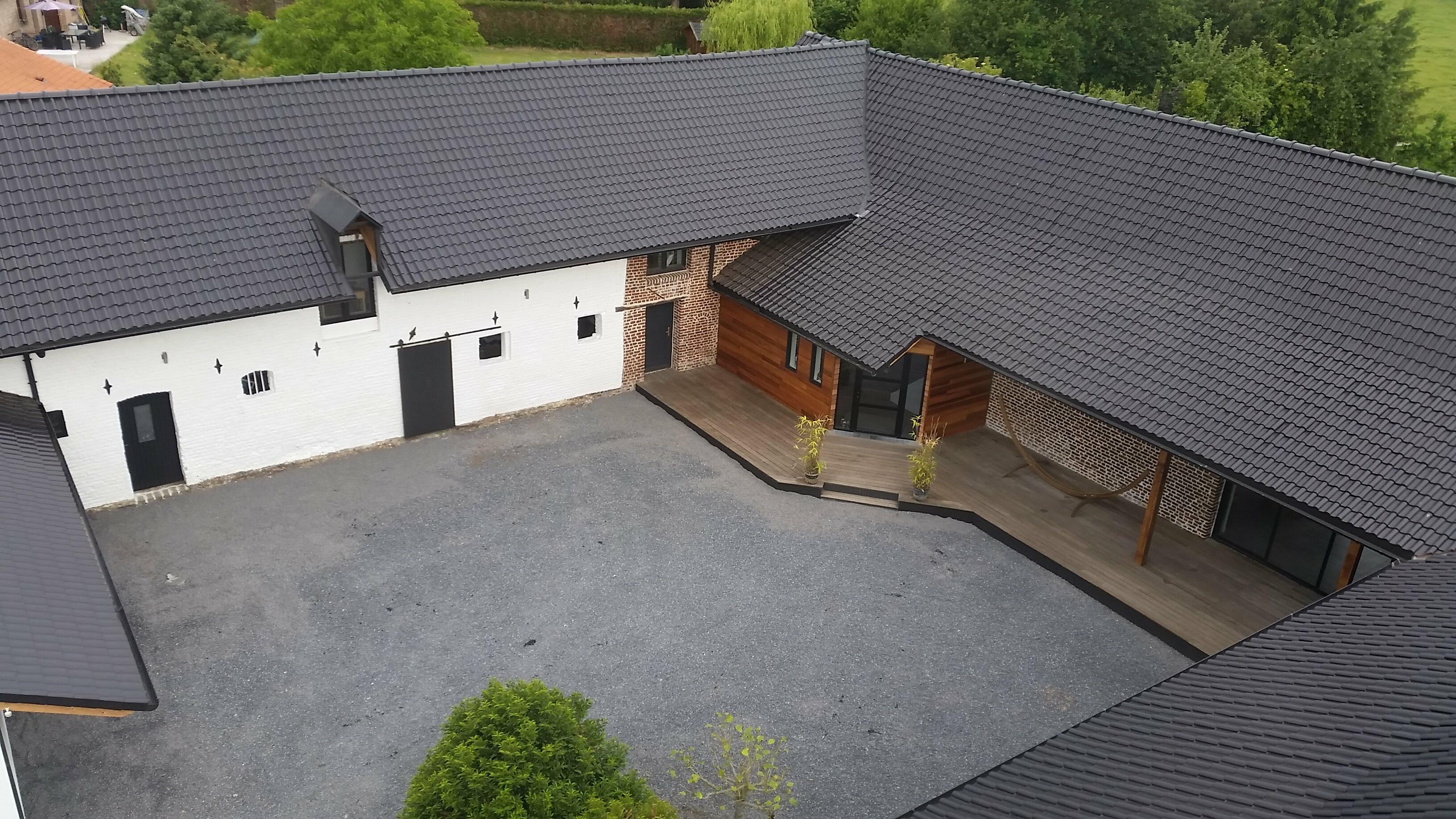 Entretien et démoussage de toiture pour préserver durablement la couverture à Hem