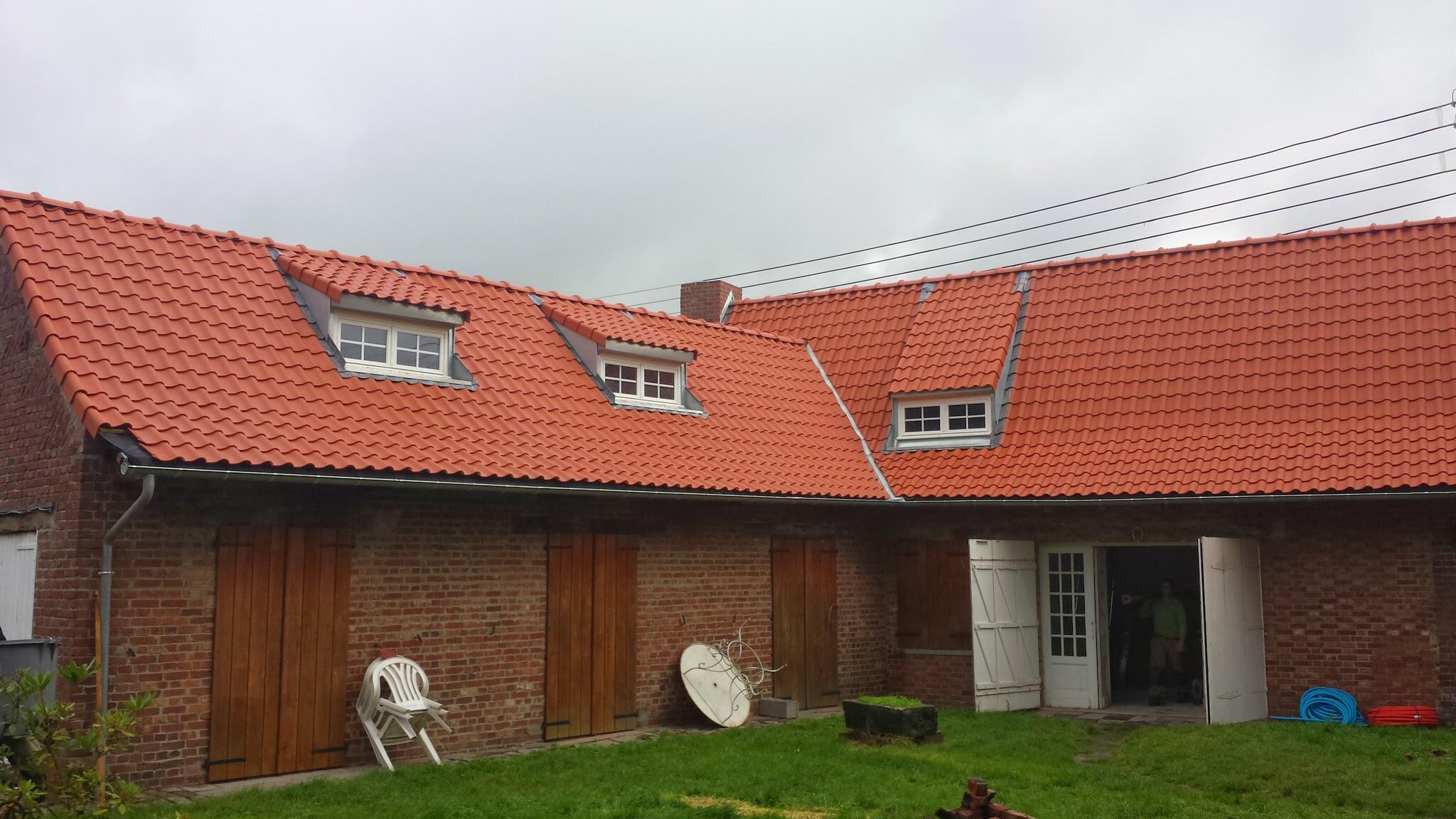 Installation de fenêtre de toit Velux pour optimiser l’apport de lumière naturelle à Mouvaux